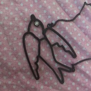 Solid black bird necklace